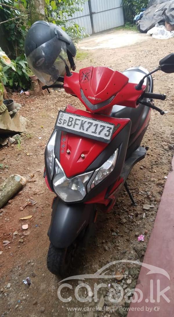 Honda dio 2017 model on road price hot sale