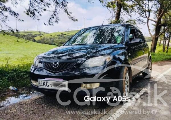 MAZDA DEMIO 2003