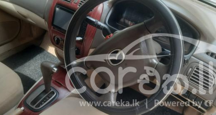 MAZDA FAMILIA 2003