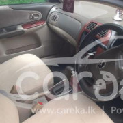 MAZDA FAMILIA 2003
