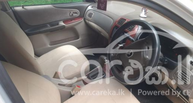 MAZDA FAMILIA 2003