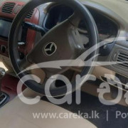 MAZDA FAMILIA 2003