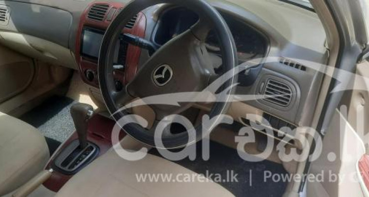 MAZDA FAMILIA 2003