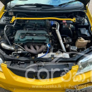 MAZDA 323 2000