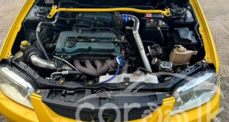 MAZDA 323 2000