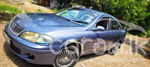 NISSAN EX SALOON 2002